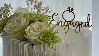 Preparing an engagement cake with wafer paper and fresh flowers #cake #engagementcake #waferpaper 