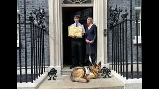 Professor Anna Lawson hands in petition at 10 Downing Street against the use of floating bus stops.