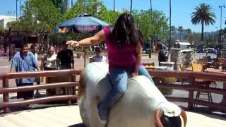 Drunk girl riding a bull at Saddle Ranch
