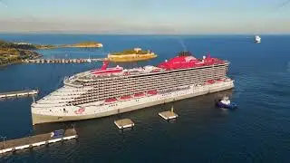 Kusadasi, Turkey. Aerial view of the cruise port and town with Virgin Voyages ship Resilient Lady...