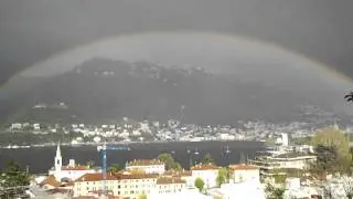 Huge triple rainbow in como lake