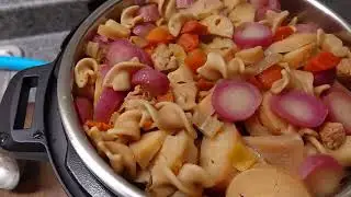 Instapot Chef Cooking Healthy Dinner Exotic Vegetables and Omaha Steak Sausage 