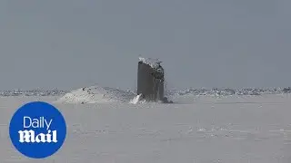 Submarine breaks the ice in spectacular fashion - Daily Mail