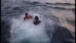 Rahul gandhi swimming sea with kerala fisher men