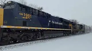 CSX M265-04. Leader CSXT ES44AC 1981, trailing CSXT CM44AH 7414. Rochester NY. 1/4/25