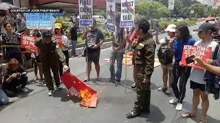 Protesters burn Chinese flag during Philippine Independence Day