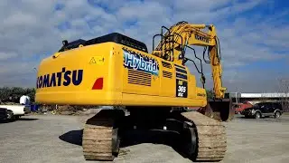 A Look Outside and Inside the Komatsu HB 365NLC Hybrid Excavator.