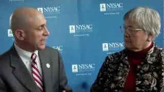NYSAC Executive Director Stephen Acquario and Genesee County Legislator Esther Leadly