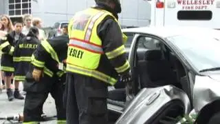 Wellesley Youth Commission use Jaws of Life at Summer Fire Dept Camp