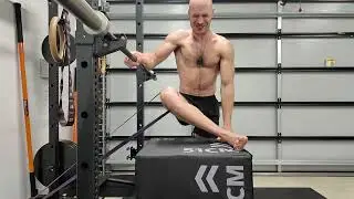 Hip ER Eccentric. Standing plyo box, low band pulling ER