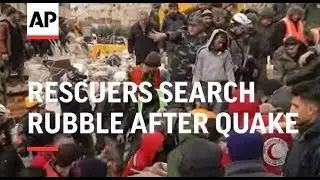 Rescuers search rubble after quake in Syria