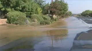 Water main break floods southeast Fresno street