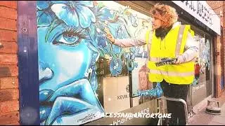 hand painted window art design on shops. temporary glass painting