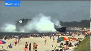 Tourists terrified as Russian military ship ploughs into beach