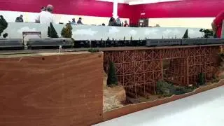 Streamlined Steam meets on a high bridge