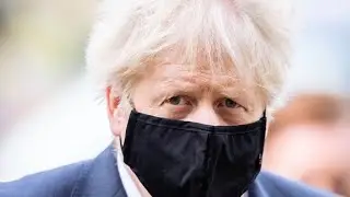 British Prime Minister Boris Johnson holds press conference on coronavirus
