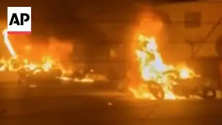 Iranian state TV broadcasts footage of street fires amid night of mass protests