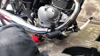 Motorcycle oil & oil filter change on Suzuki marauder Gz 125. Motul oil, 10 & 17 mm socket.