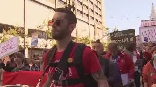 May Day paradegoers protest for worker's rights