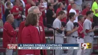 Couple's streak of 50 straight years of singing the National Anthem before games continues
