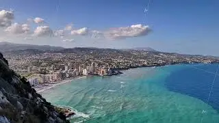 Experience the captivating and breathtaking coastal view of a modern cityscape right by the sea
