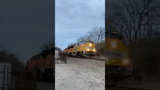 NS grain train with a UP SD70ACe-T4 leading and two BNSFs trailing