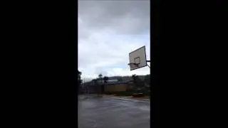 3QTR COURT OVER THE HEAD BASKETBALL SHOT
