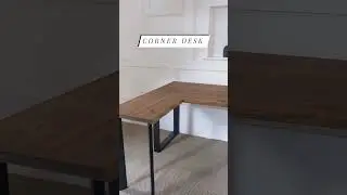Reclaimed wood corner desk with industrial box legs and uneven edges