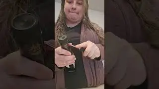 Getting the caps off Entimio olive oil bottles.  DOP cap removal