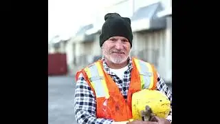 Total Work Wear and Safety - Man put on hard hat