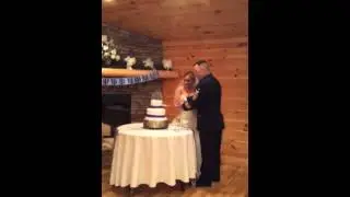 Roger and Amanda cutting the cake just got married October