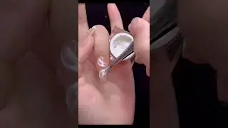 Delicate manicure with white elements.  Ideal for wedding