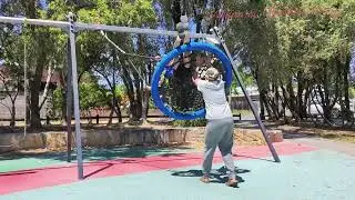 I am pushing my brothers, who are on the slide.