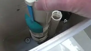 Porcher toilet flush valve removal. (Aligning the lugs for removal).