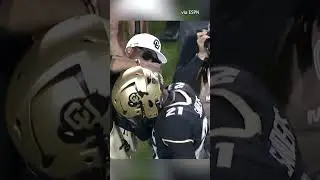 Deion helped his son Shilo put his chain back on after his pick six #shorts