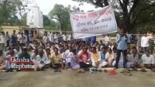 Local block NH at Amapani demanding arrest of a teacher accused of rape
