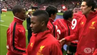 Suarez and Evra shake hands