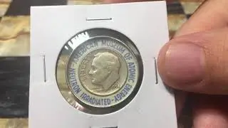 Neutron Irradiated Dime - American Museum of Atomic Energy