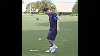 Messi juggling an orange