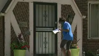 Detroit public school workers work to find out if students want in person or online classes this...