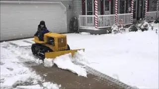 My Son Plowing Snow On His Caterpillar Replica Mini Dozer