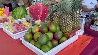 Stock Video Tropical Fruits In Miami, Pineapple, Mango, etc.