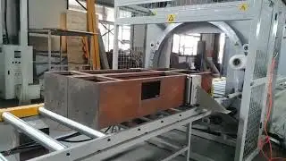 Fully automatic horizontal ring wrapping machine with automatic clamp and cut system