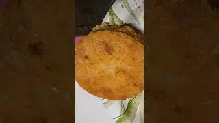 Homemade curry chicken pot pie with cornbread crust and abiscuit
