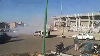 Security forces using tear gas agaist football fans after anti-Turkey slogans.