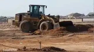 CAT 938G Wheel Loader Backfilling