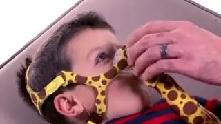 Leak correction dial adjustment of Wisp pediatric mask | Philips | Minimal contact nasal mask