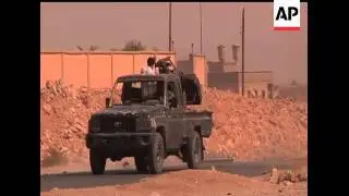 The Associated Press is at the front to document Libyan Revolutionary forces attempt to take one of