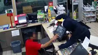 Video: 2 people wanted in Shell gas station robbery