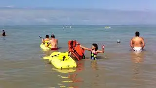 BEACH DORETBEGARDAM NEEKAMOTAMEDRASA NAVEED MOTAMEDRASA ARMEEN VATANKHAH KAYAKING AND SWIMMING BEACH